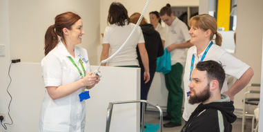 occupational therapy students learning at the mock house