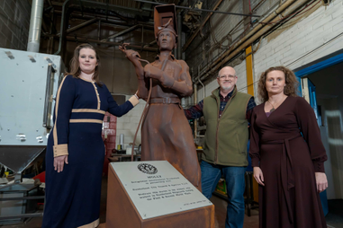 Sunderland researchers standing alongside the Making Molly sculpture