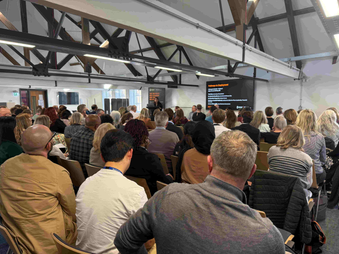 Audience members at the Institute for Economic and Social Inclusion Conference