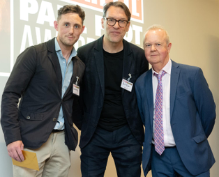 Three men standing