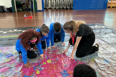 University Staff leading activity with school students
