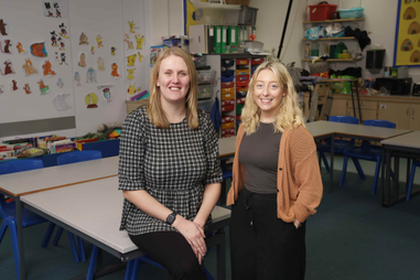 Two women in a classroom