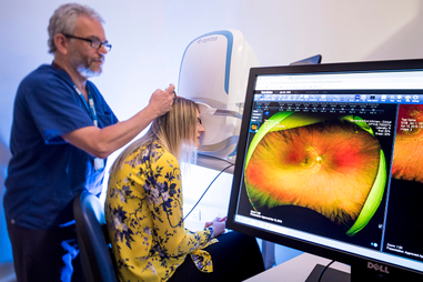 Woman having an eye scan