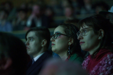 People watching a film