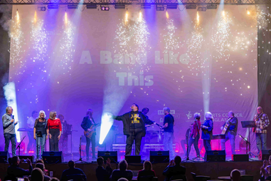 A band performing on stage