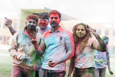 Four students standing
