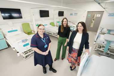 Three women standing in University mock hospital ward