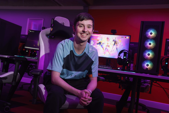 Student sat in front of Gaming PC