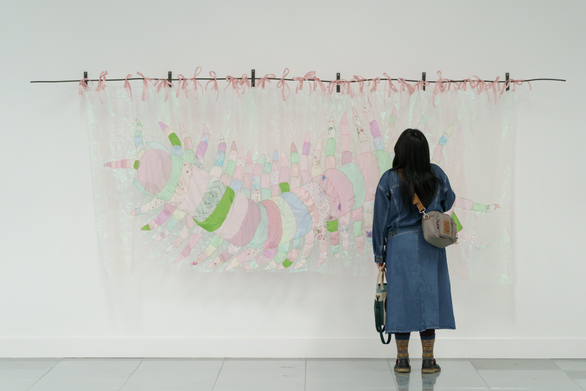 Woman looking at artwork