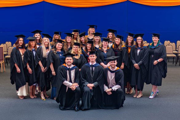 Group of graduates in caps and gowns