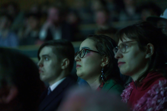 People watching a film