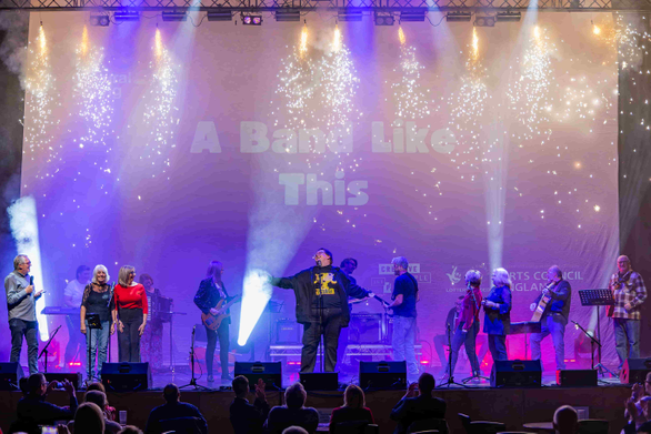 A band performing on stage