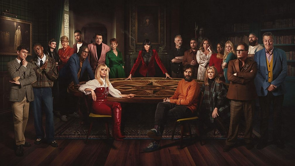 Group of famous people around a table