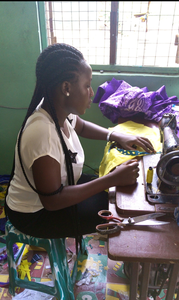 Student using a sewing machine