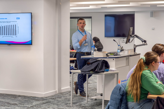 Man teaching a class