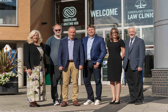 Dr Derek Watson, University colleagues pictured outside the Reg Vardy Centre with David Leask