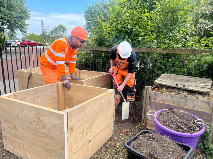 Volunteers building plant box