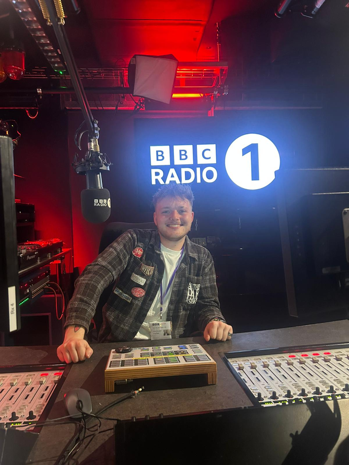 Volunteer behind radio desk