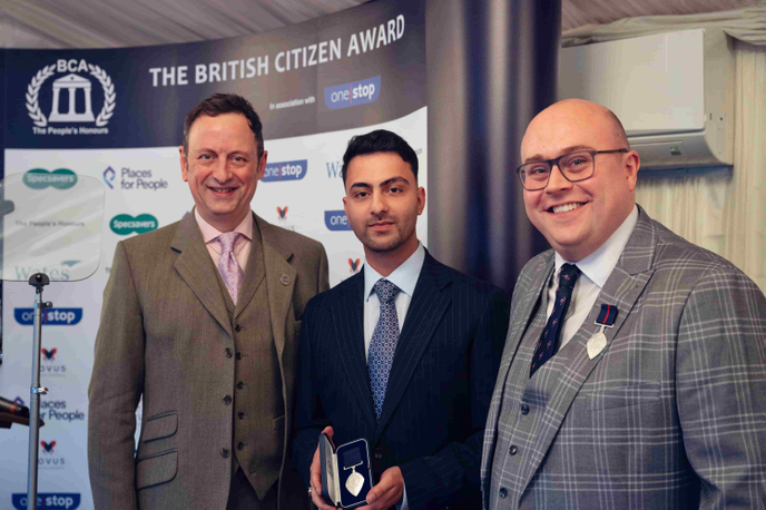 Student with hosts and fellow award winner