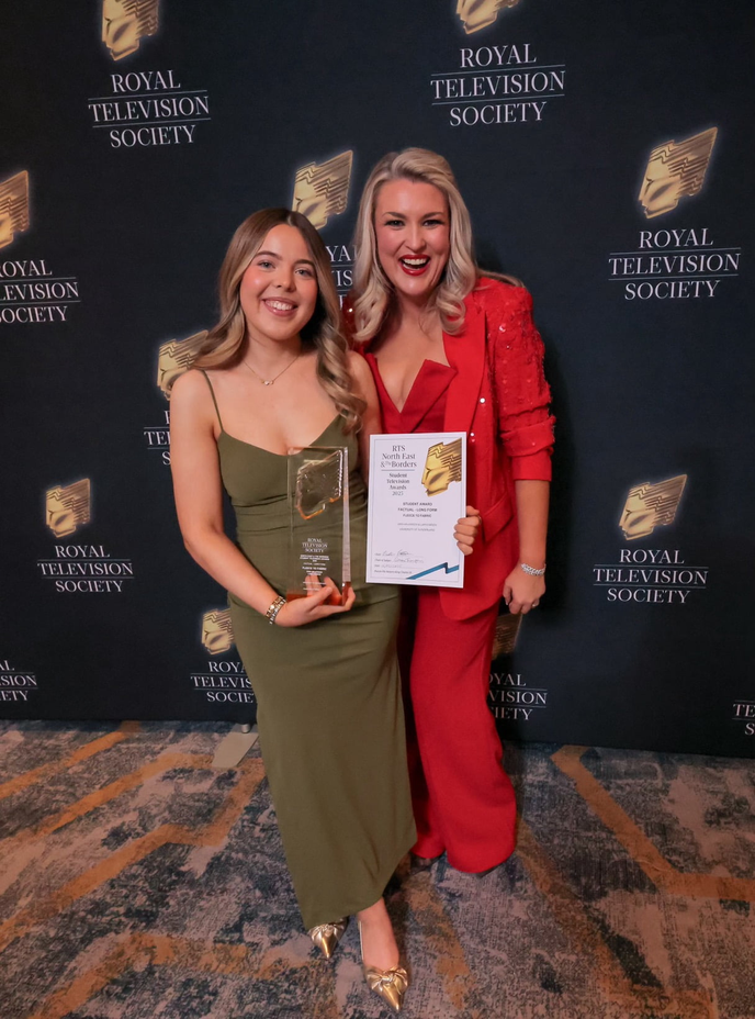 Two women standing