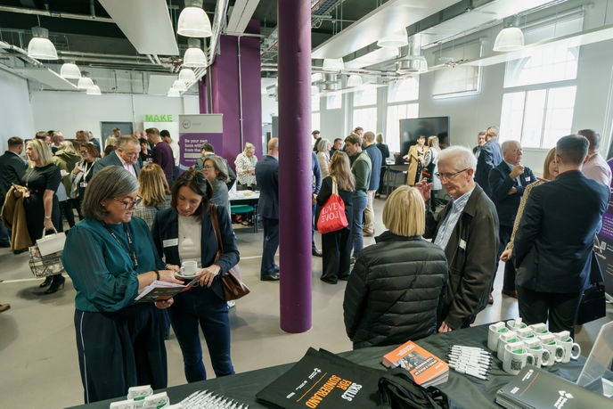 Crowded room with different stalls
