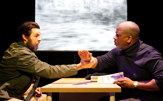 Two men sitting at a table