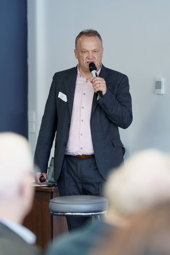 Academic speaking with microphone