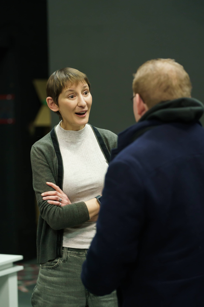 Actor talking to a student