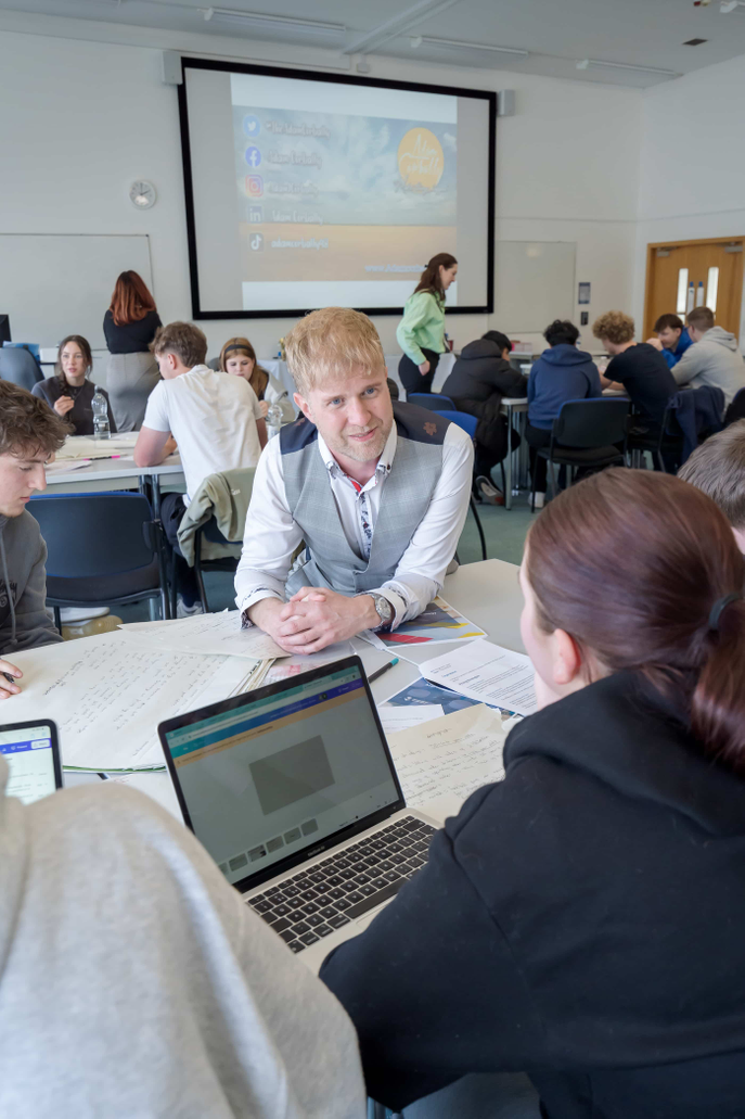 Apprentice star Adam Corbally working with students at the University of Sunderland's Business Boardroom Battle