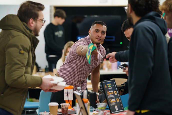 Student showing information on a table