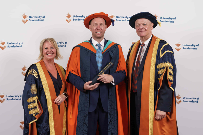 Honorary Graduate with Chancellor and Vice-Chancellor in gowns