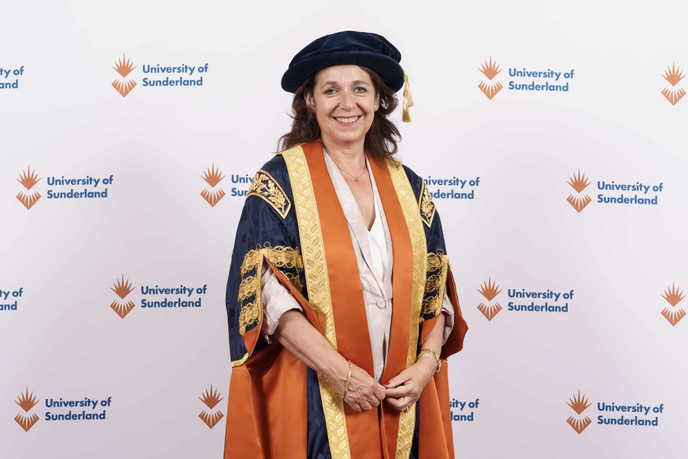 Pro-chancellor Julie Elliott in cap and gown