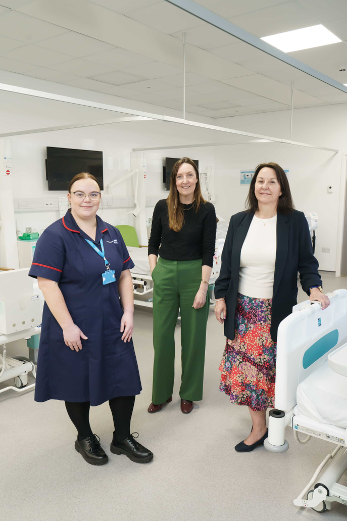Three women standing in University mock hospital ward