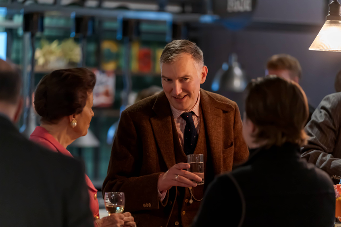 Guests at the dinner talking