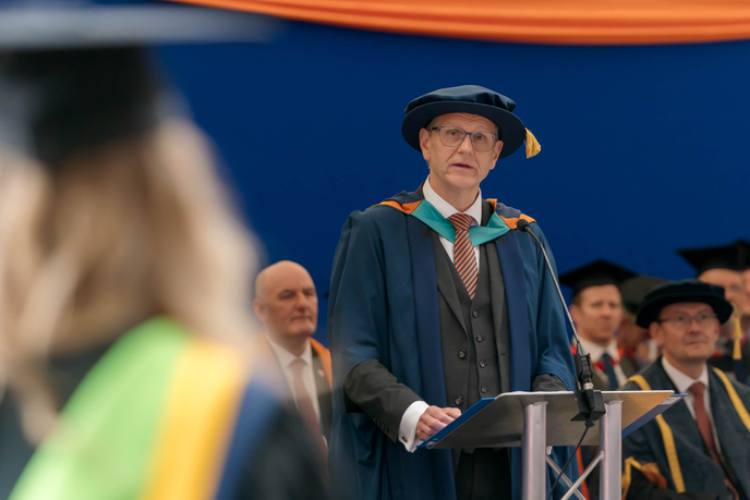 Professor Scott Wilkes at graduation ceremony