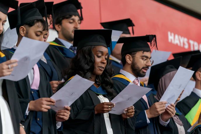 Medical Graduates taking the Hippocratic Oath at graduation ceremony