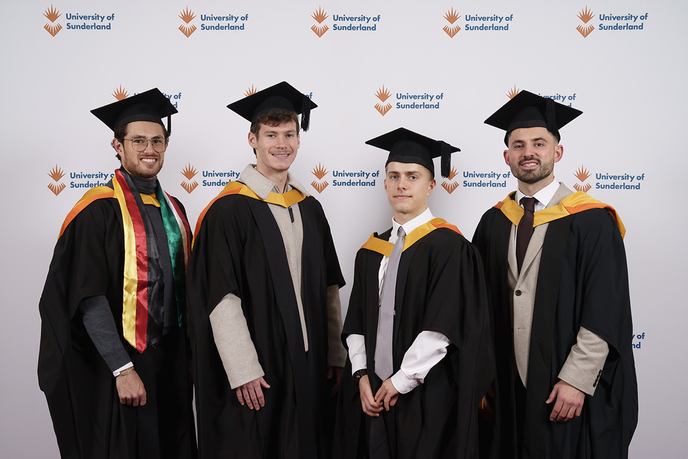 Students in caps and gowns