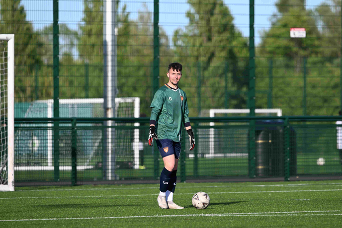 Man standing with a football