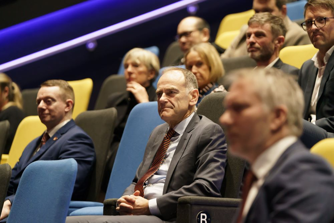 People sitting in cinema seats