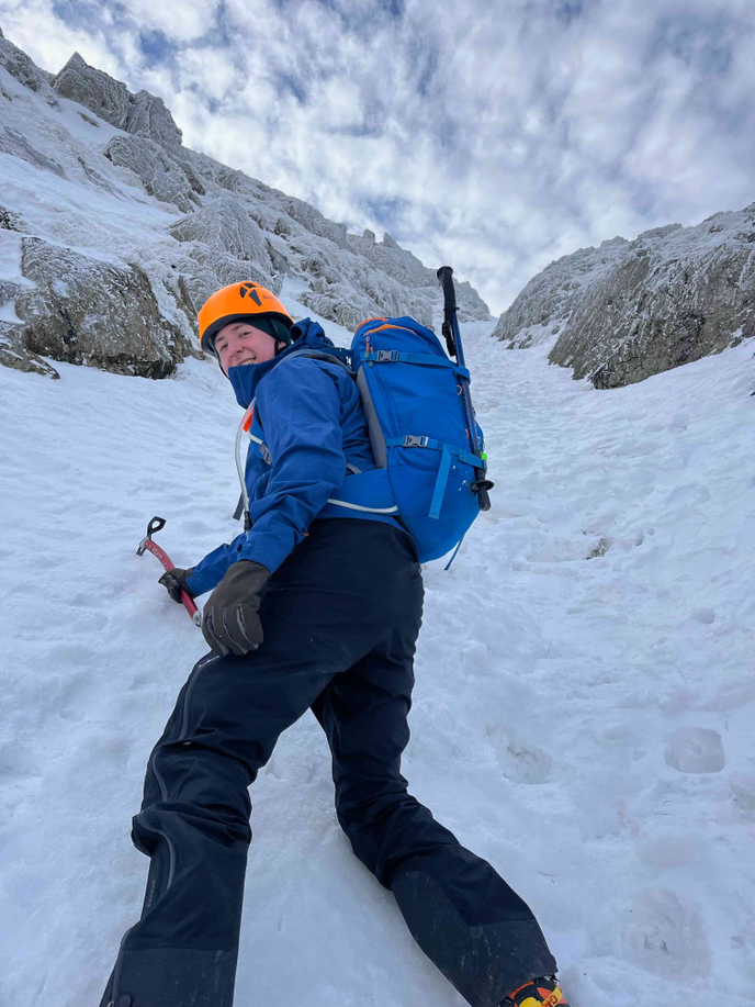 Student mountaineering in snowy conditions