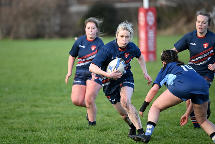 Students playing rugby