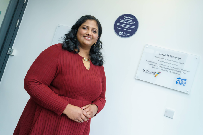 VJ and her purple plaque at Hope Street Xchange, University of Sunderland City Campus