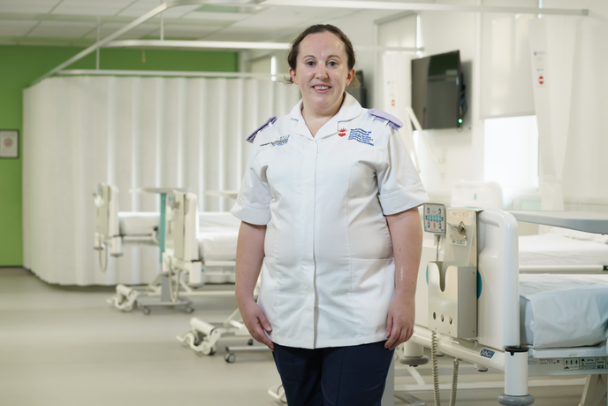 Nurse standing in hospital ward