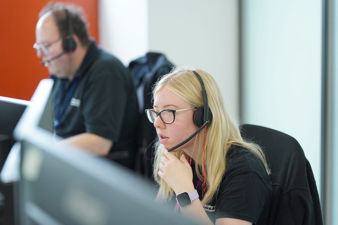 A volunteer helping take calls on the University of Sunderland's Clearing line