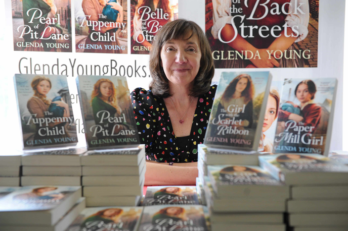 Women sitting with books