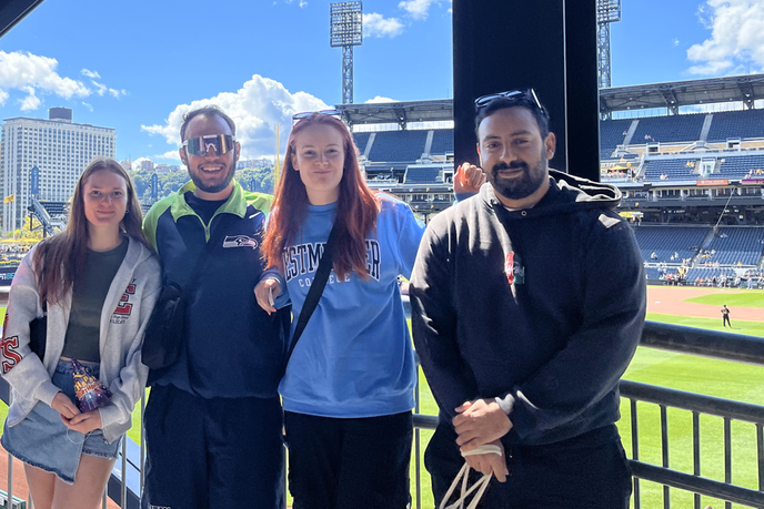 Students at a baseball stadium