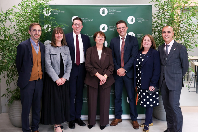 Academics from the University and AIP foundation stood together