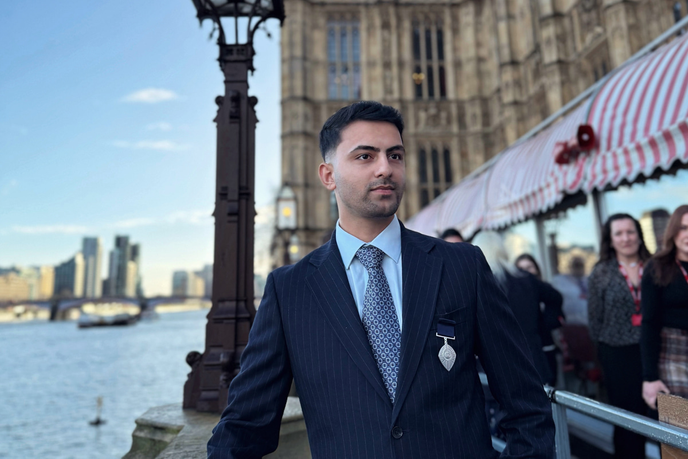 Student stood outside the Palace of Westminster