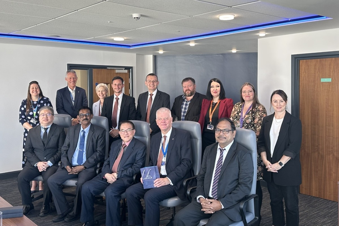 Delegates and University staff sat together