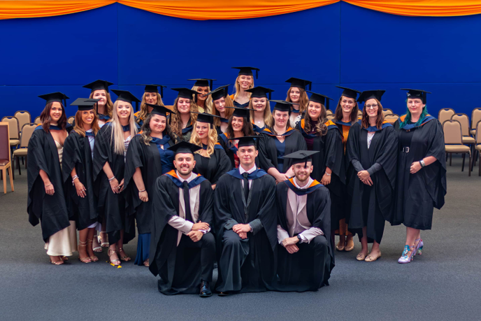 Group of graduates in caps and gowns